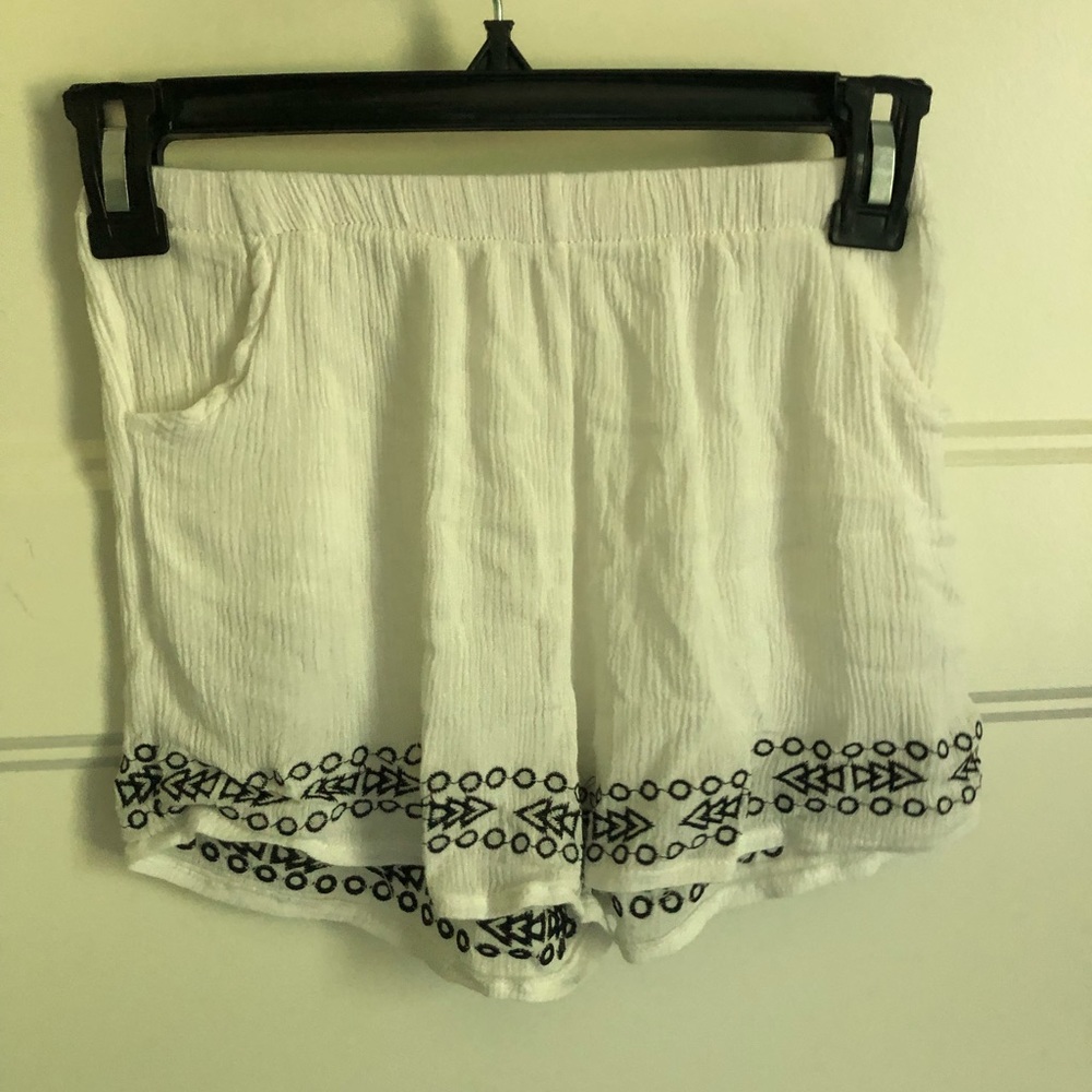 White shorts with blue design